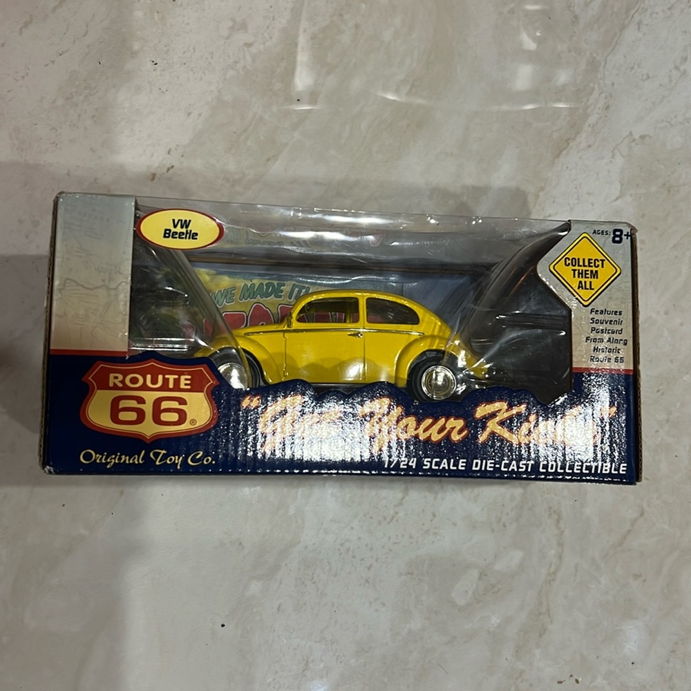 “Get Your Kicks” die cast oval window vw beetle.